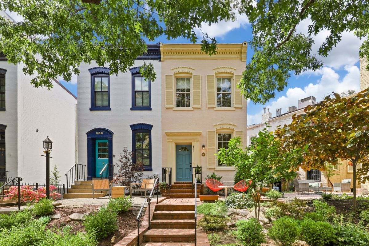 duplex with plants in the foreground